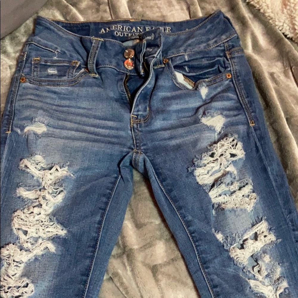 blue ripped jeans